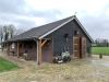 Bijgebouw woonhuis met paardenbak